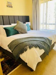 Katil atau katil-katil dalam bilik di Phoenix Rising Apartment