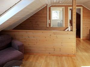 a room with a staircase in a house at 15 person holiday home in Treungen in Treungen +22 photos