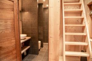 a bathroom with a shower and a toilet and a sink at Chalet de luxe - Alpes française in Colmars +27 photos