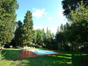 Πισίνα στο ή κοντά στο Cosy holiday home in Tuscany with shared swimming pool