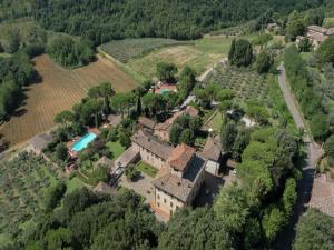 an aerial view of a house with a swimming pool at Cozy Holiday Home with Pool in Sienna Italy in Siena