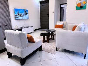 Posezení v ubytování R&d Homes 2