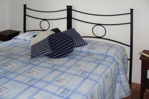 Ένα ή περισσότερα κρεβάτια σε δωμάτιο στο Farmhouse stay Giulia Volterra