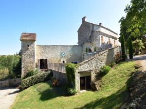 an old stone house on a hill with a yard at Castle 12th century with private pool close to Agen in Saint-Caprais-de-Lerm +35 photos
