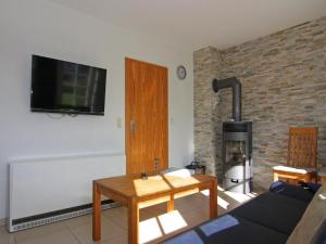 TV a/nebo společenská místnost v ubytování Terraced house, Friedrichkoog-Spitze