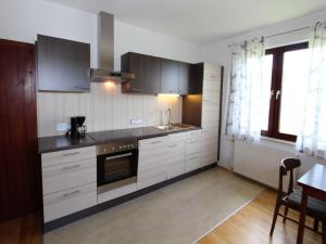 Kuchyň nebo kuchyňský kout v ubytování Apartment in Köttmansdorf near Wörthersee