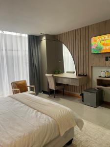 En eller flere senge i et værelse på The Legacy Hotel and Spa + 15 billeder