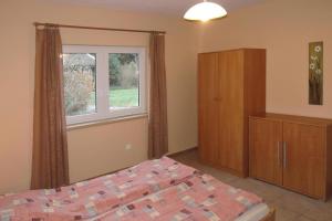 Postel nebo postele na pokoji v ubytování holiday home in Kolczewo for 5 persons