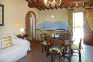 Ένα ή περισσότερα κρεβάτια σε δωμάτιο στο Agriturismo Cima alla Serra, Pisa