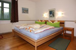 Postel nebo postele na pokoji v ubytování Appartementhaus Kranichblick in Breege + 14 fotografií