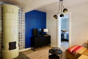 Postel nebo postele na pokoji v ubytování tolle Ferienwohnung in einem reetgedeckten Haus + 43 fotografií