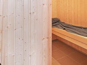 a wooden cabin with a bunk bed in it at 5 star holiday home in Kappeln in Kappeln