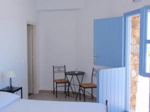 Postel nebo postele na pokoji v ubytování Villa Kalamiotissa