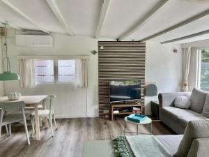 Χώρος καθιστικού στο Furnished chalet Sint Maartenszee
