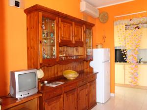 Η κουζίνα ή μικρή κουζίνα στο Apartments Costa Rei
