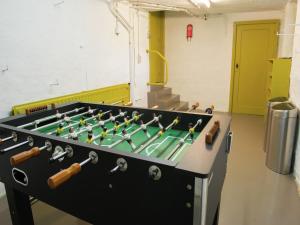a ping pong table in a room at Mansion in Spa Liege with private garden in Spa
