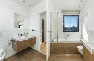 un bagno con lavandino, vasca e WC di Villa Sara a Vrsar Altre 47 foto