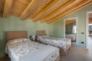 Ένα ή περισσότερα κρεβάτια σε δωμάτιο στο La terrazza di Elisabetta