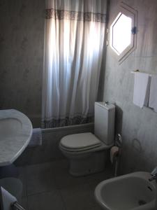 Koupelna v ubytování Hotel Il Falchetto + 18 fotografií