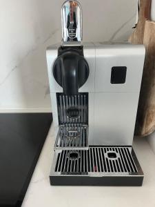 a coffee maker sitting on top of a counter at Umi in Ostend