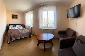 Una cama o camas en una habitación de Pokoje Gościnne U Haliny