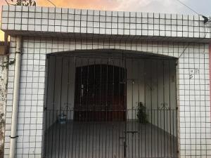a building with a gate in front of it at Pedro Teixeira House in Belém