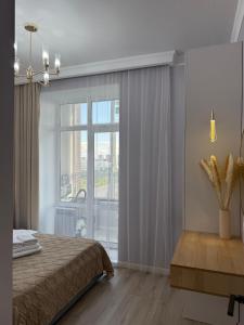 アスタナにあるЖК Alpamys апартаменты рядом с Expo и Ботаническим садомのギャラリーの写真