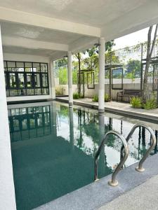 Πισίνα στο ή κοντά στο Teddyslodge Homestay