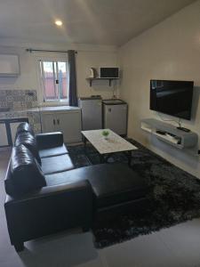 Η κουζίνα ή μικρή κουζίνα στο Tropical Hideaway Close to the Beach