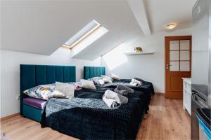 Ένα ή περισσότερα κρεβάτια σε δωμάτιο στο Elephant Luxury Penthouse