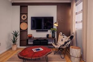 TV a/nebo společenská místnost v ubytování C Breeze 10