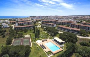 an aerial view of a building with a swimming pool at Marina Hill Apartment in Lagos