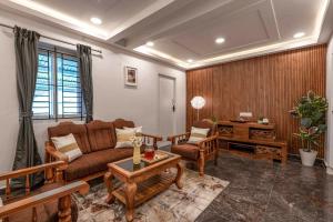 Χώρος καθιστικού στο EKOSTAY - Garden Grove Villa