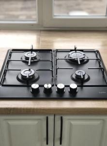 Kuchyň nebo kuchyňský kout v ubytování Квартира біля парку Софіївка