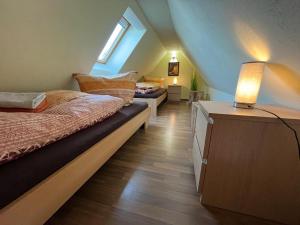 Postel nebo postele na pokoji v ubytování Schöne Ferienwohnung in Kurort Oberwiesenthal