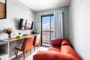 Μια τηλεόραση ή/και κέντρο ψυχαγωγίας στο Apto Novo no Centro com Vista - Até 4 Pessoas