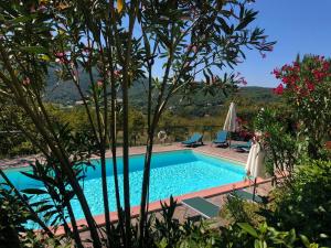 a swimming pool in a villa with a view at Scenic Stay in Restored Retreat in Monterchi