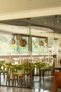 En restaurant eller et andet spisested på Resort Malia Beach Experience in Muro Alto