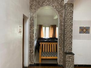 a hallway with a couch in a living room at Ckcm Resort in Dindigul