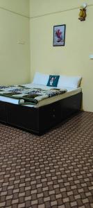 Postel nebo postele na pokoji v ubytování 3 Seasons Homestay Chikmagalur