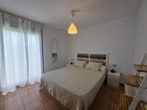 Postel nebo postele na pokoji v ubytování 1249 Paradise Home Majanicho + 38 fotografií