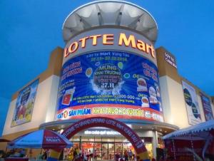 a shopping center with a sign that reads coffee man at Koala1 Apartment in Vung Tau