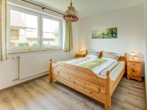Postel nebo postele na pokoji v ubytování Garden Apartment in Wildsteig