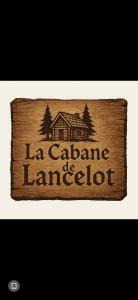 a sign that says la cadana be laminated at La cabane de Lancelot Chambre Campagne in Laperrière-sur-Saône +3 photos