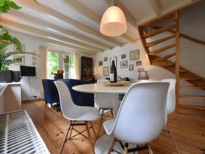 a dining room with a table and chairs at Serene Getaway in Edam in Edam