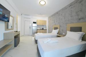 Køkken eller tekøkken på Atlantis Suites and Rooms Nikiti