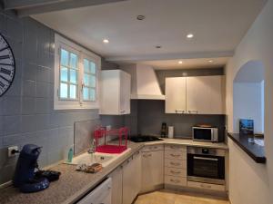 Køkken eller tekøkken på Le nid des agrumes