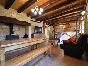 TV a/nebo společenská místnost v ubytování Timeless Charm in Périgord