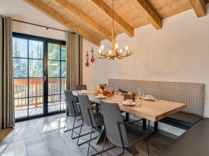 a dining room with a table and chairs at Chalet in Krimml near Zillertal Ski Arena in Krimml
