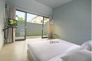 Gallery image of The Grey Boutique Inn in Legian
